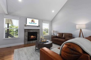 Televisie, een open haard en tafelvoetbal