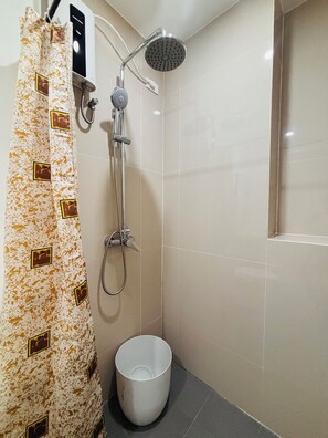 Shower, free toiletries, hair dryer, slippers