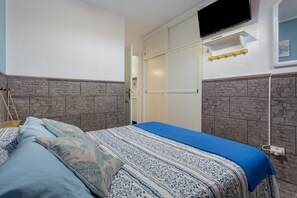 1 habitación, tabla de planchar con plancha, wifi y ropa de cama 