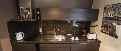 Fridge, microwave, stovetop, coffee/tea maker