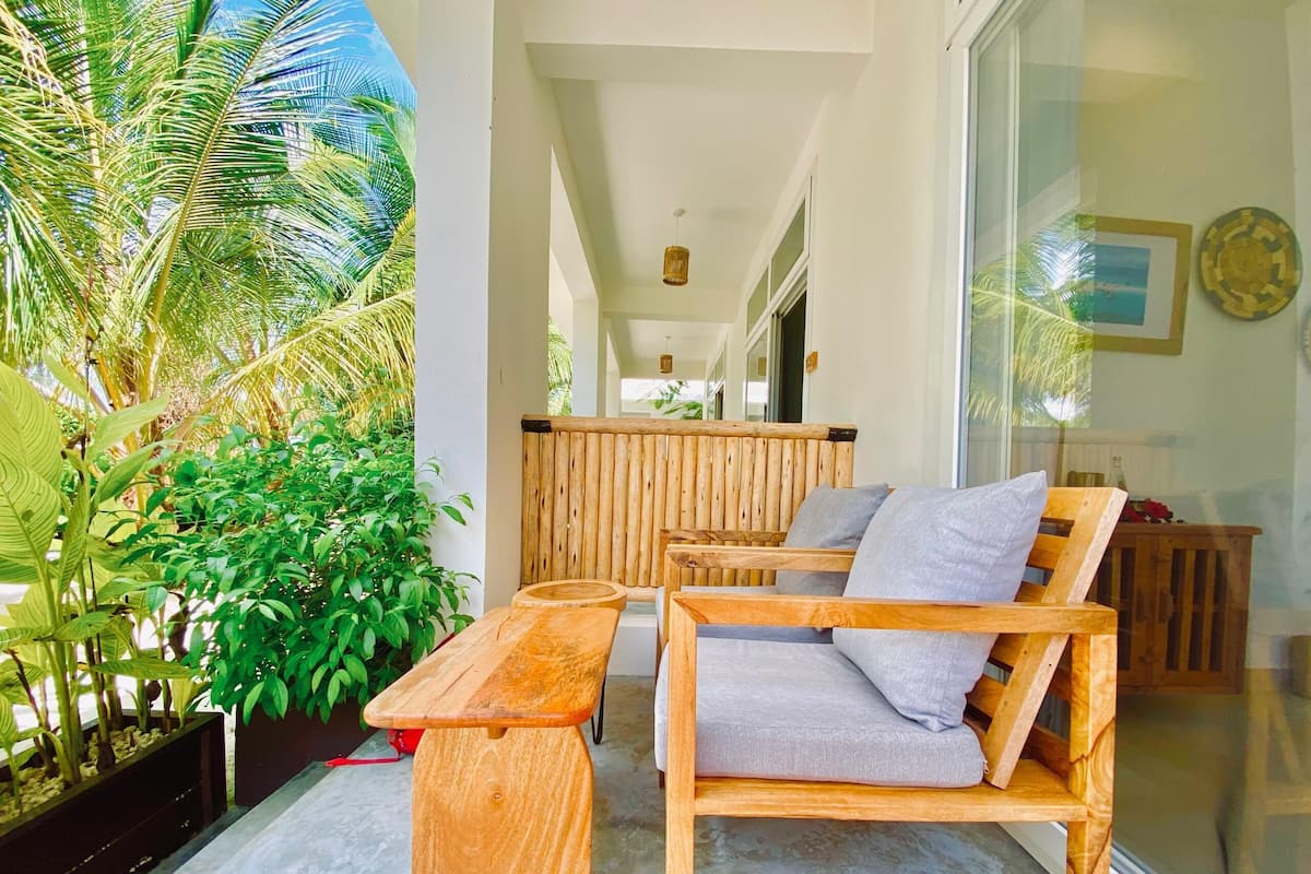 Deluxe Suite, Pool View | Premium bedding, pillow-top beds, free minibar items, in-room safe