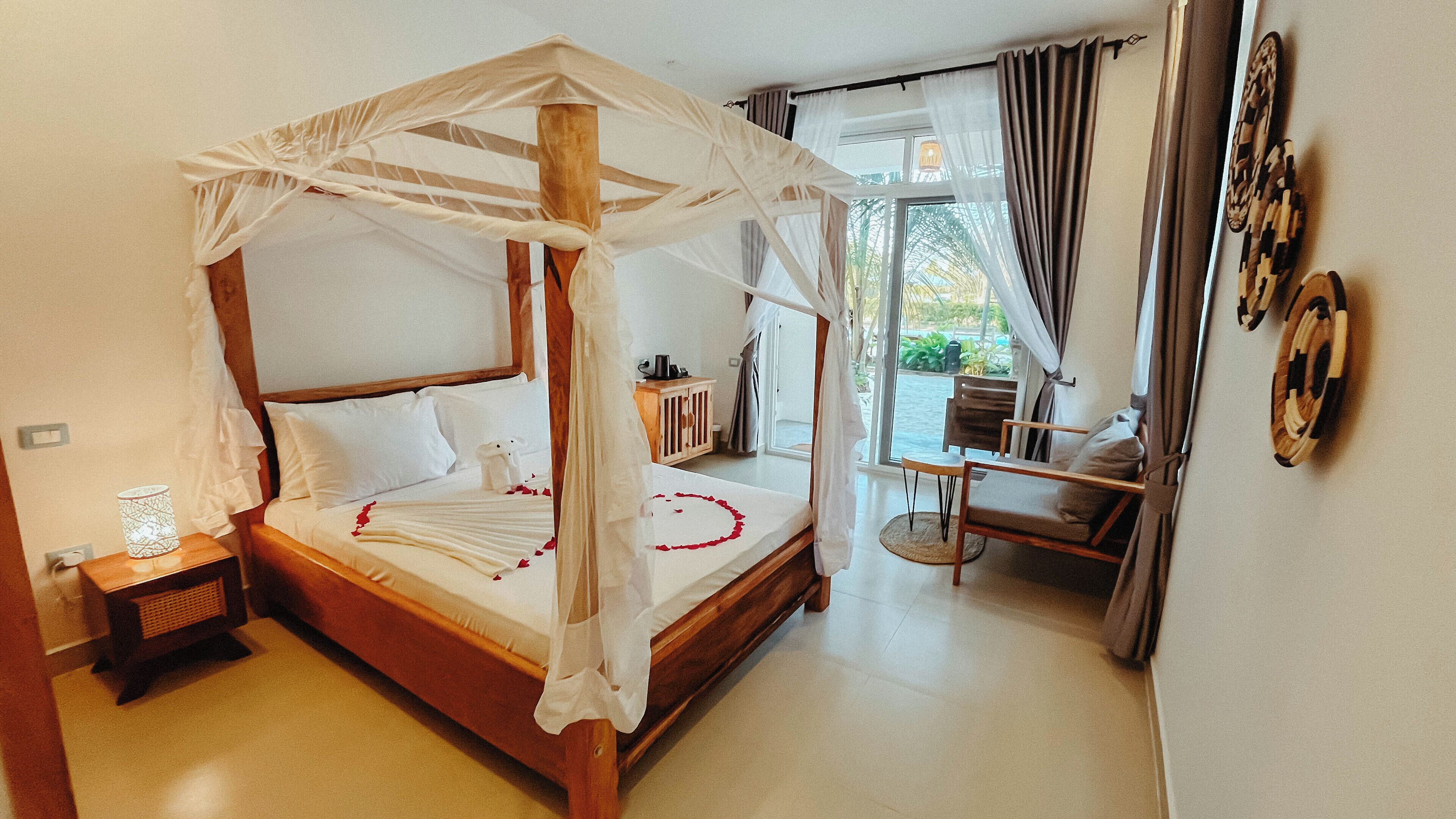 Premium bedding, pillowtop beds, minibar (some free items), in-room safe