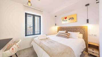 2 slaapkamers, een strijkplank/strijkijzer, gratis wifi, beddengoed