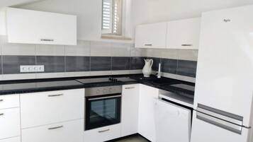 Apartment | Private kitchen | Fridge, microwave, oven, stovetop