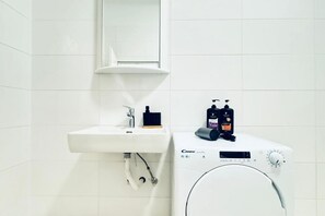 Shower, hair dryer, soap, shampoo