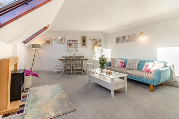 Lounge with smart Tv and electric log fire