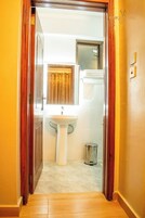 Standard Double Room, Garden View | Bathroom | Shower, bathrobes, slippers, towels