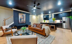 TV, fireplace - Luxury 4BR Home w/ Game Room, 10 Beds & Nash Vibes (Nashville)