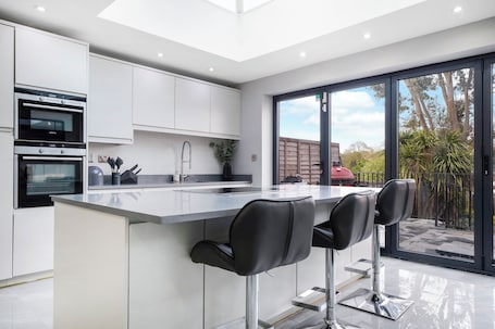 Private kitchen. Charming 3-bedroom house in Pinner