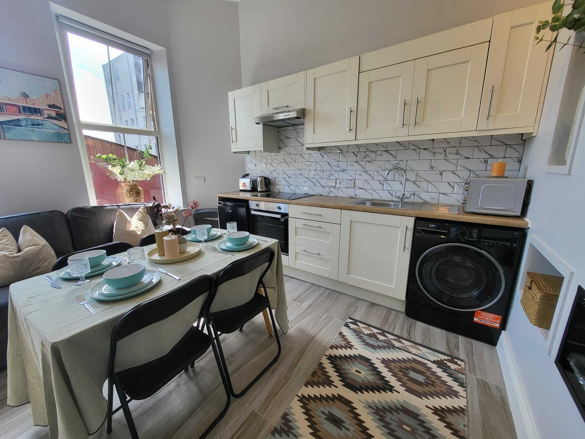 Coffee/tea maker, fridge, microwave, oven