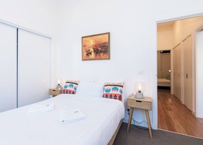 2 bedrooms, desk, iron/ironing board, travel crib