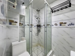 Hair dryer, towels, soap, shampoo