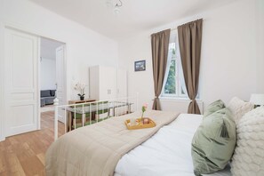 3 bedrooms, desk, iron/ironing board, travel cot