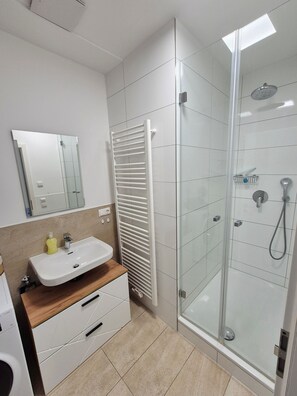 Hair dryer, towels, soap, toilet paper