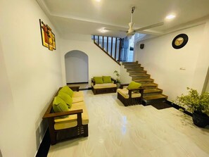 TV, foosball, books, music library