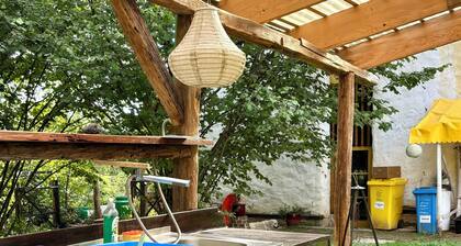 Cozy shepherd's hut in an edible landscape on a permaculture farm