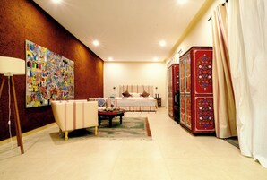 Luxury Suite, Mountain View | Minibar, in-room safe, individually decorated, individually furnished