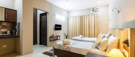 3 slaapkamers, een strijkplank/strijkijzer, gratis wifi, beddengoed
