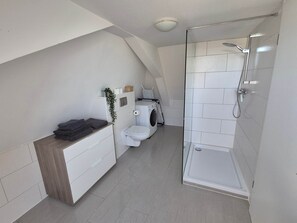 Hair dryer, towels, soap, toilet paper