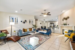 TV, fireplace, books