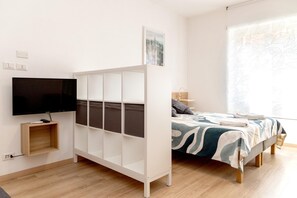 1 slaapkamer, een strijkplank/strijkijzer, wifi, beddengoed