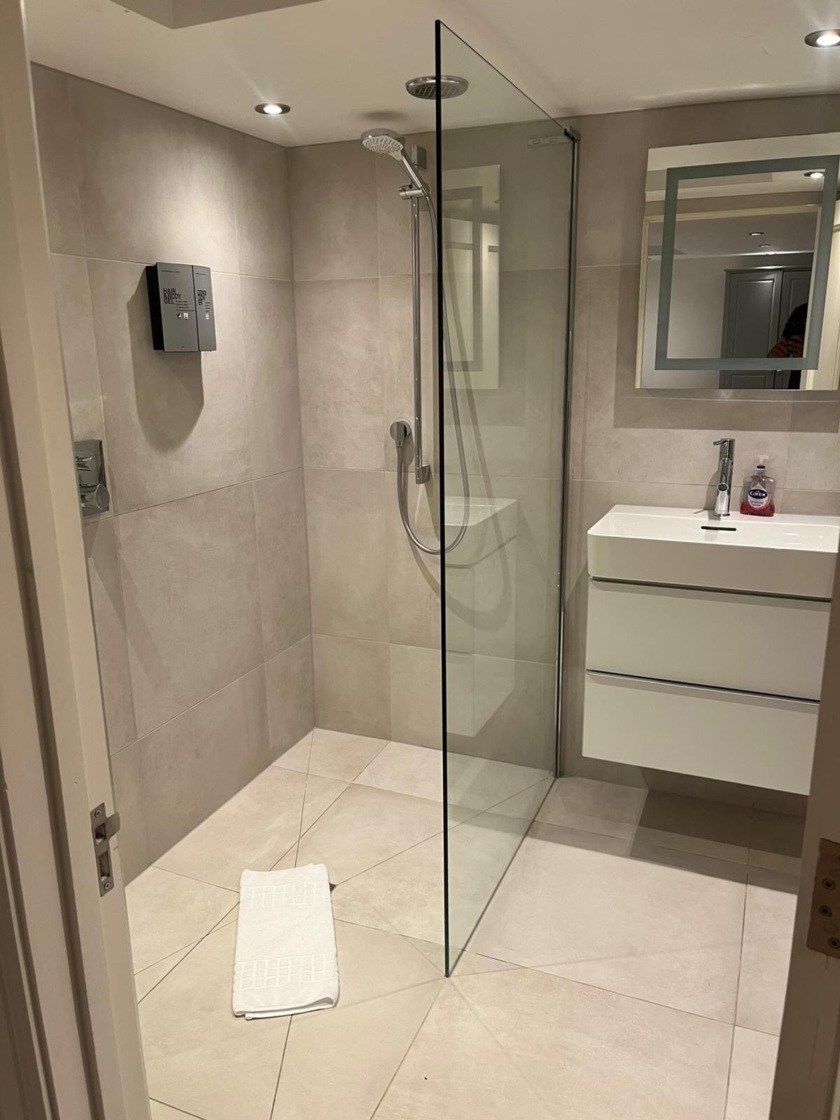 Hair dryer, towels, soap, toilet paper