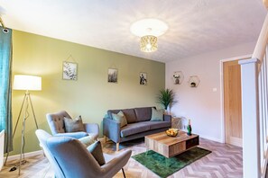 Maison, patio | Coin séjour