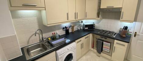 Fridge, microwave, oven, coffee/tea maker