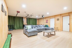 TV, fireplace, table football, books