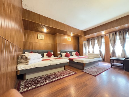 Deluxe Room, 2 Queen Beds | Desk, laptop workspace, free WiFi, bed sheets