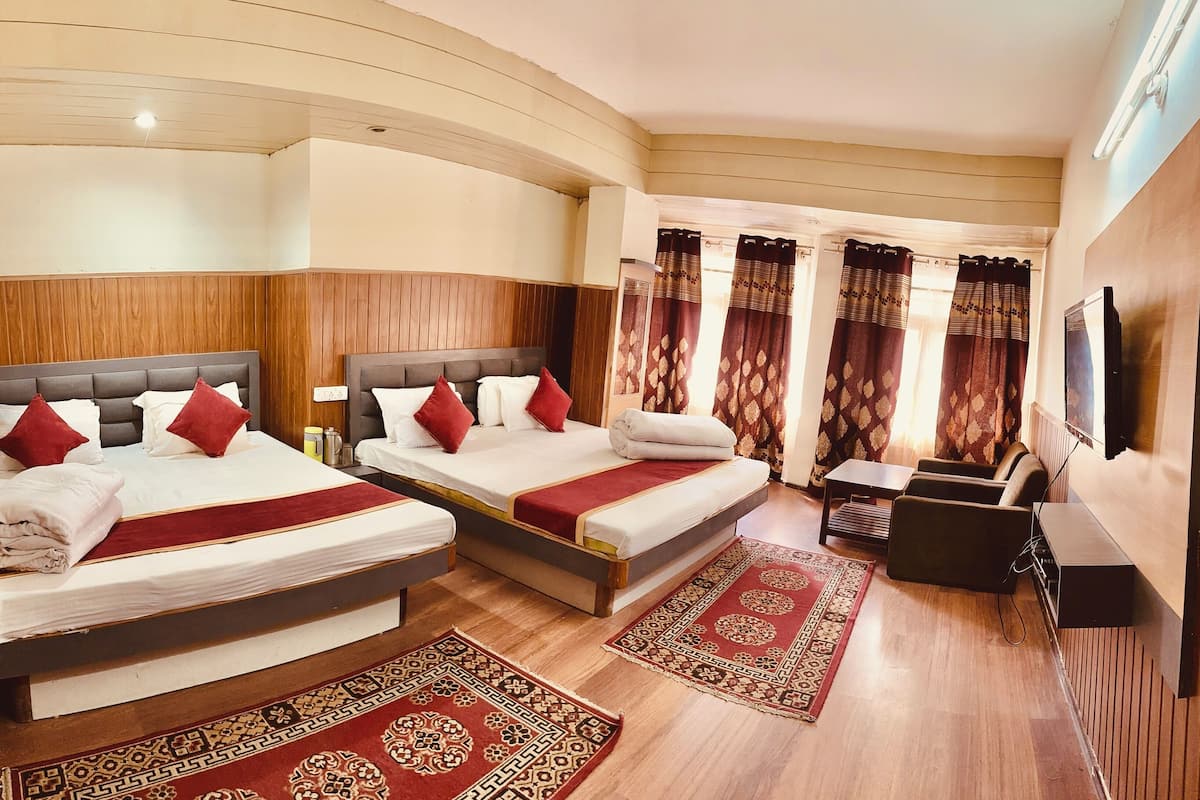 Deluxe Room, 2 Queen Beds | Desk, laptop workspace, free WiFi