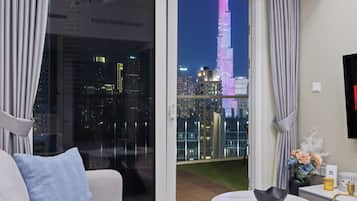 2 Bedroom Apartment - High Floor & Full Burj Khalifa view | Living area | 55-inch Smart TV with digital channels