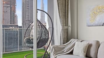 1 Bedroom Apartment - Burj Khalifa View | Living area | 55-inch Smart TV with digital channels