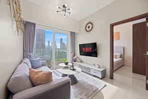 2 Bedroom Apartment - High Floor & Full Burj Khalifa view | Living area | 55-inch Smart TV with digital channels - Luxury Apartments in Dubai Business Bay (Dubai)