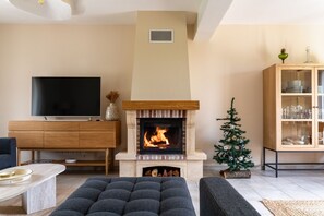 Smart TV, fireplace, foosball, table tennis