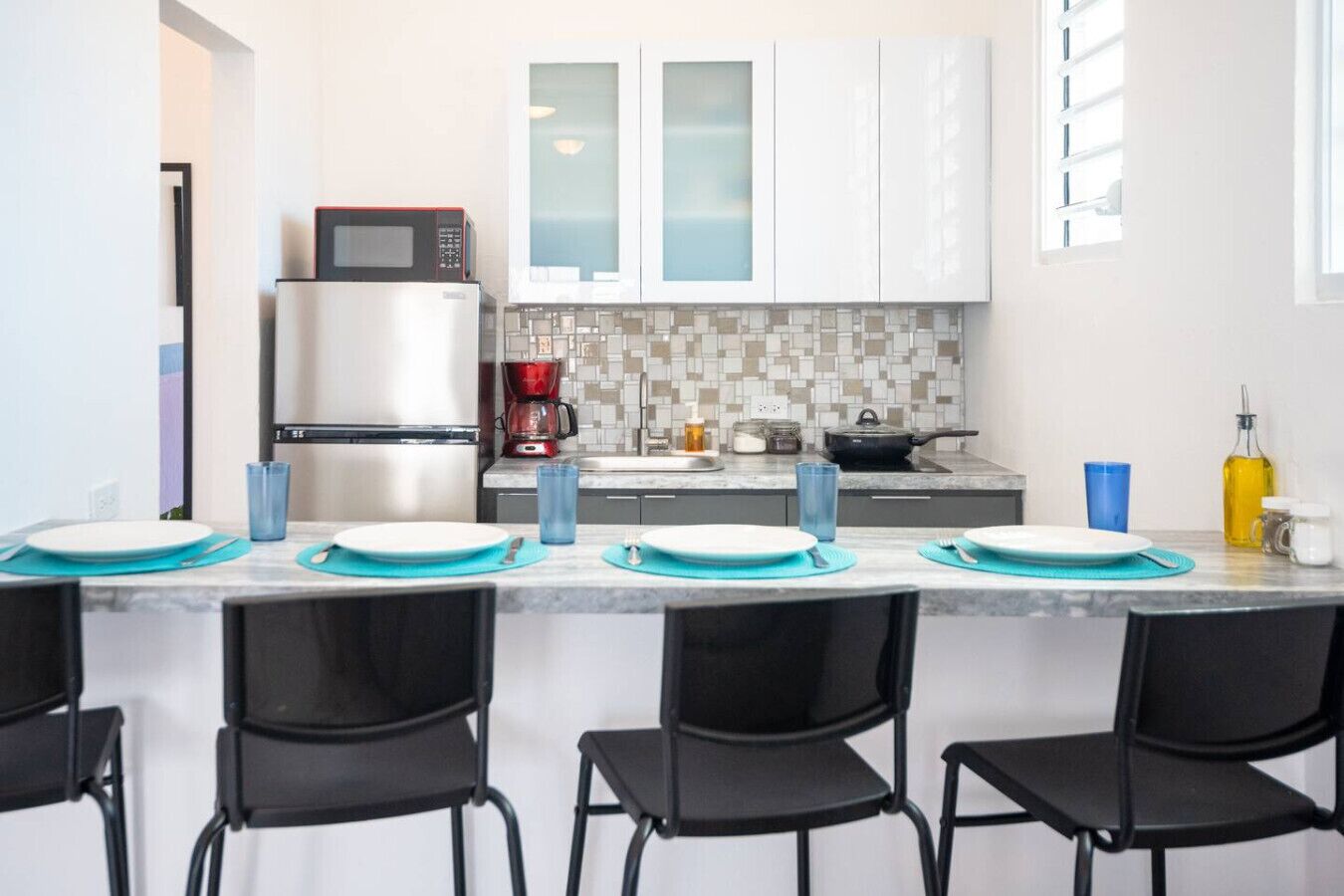 Fridge, microwave, stovetop, coffee/tea maker