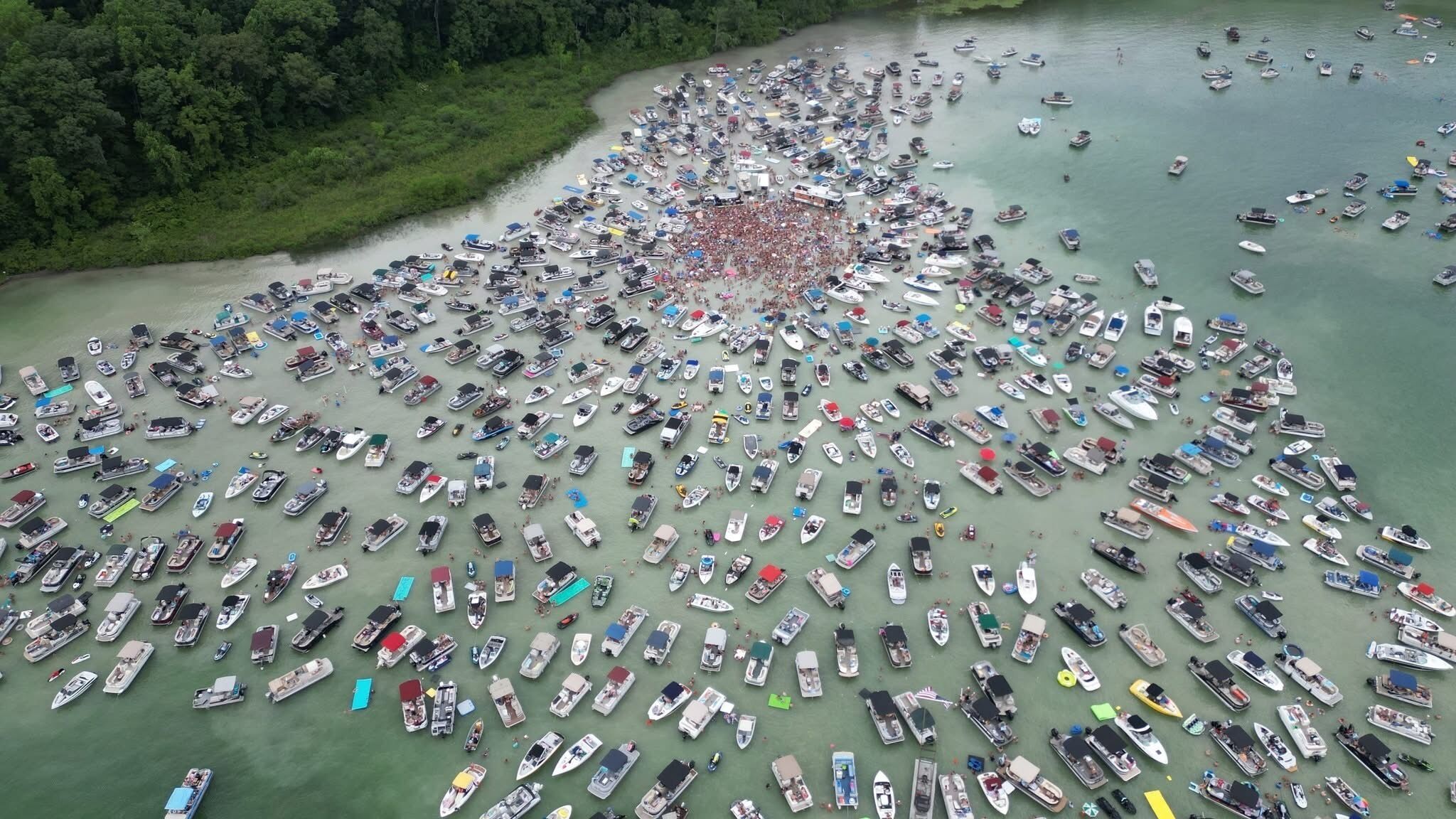 An aerial view of a large marina filled with numerous boats.
