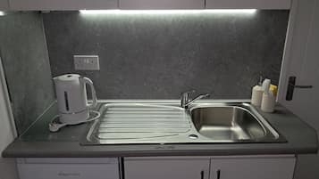 Fridge, microwave, electric kettle, toaster