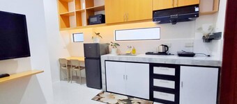 Patio 1st floor 1-bedroom apartment in delightful Dipolog City with AC