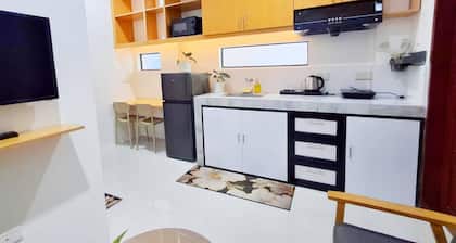 Patio 1st floor 1-bedroom apartment in delightful Dipolog City with AC