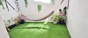 Patio 1st floor 1-bedroom apartment in delightful Dipolog City with AC