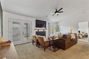 Smart TV, fireplace, books