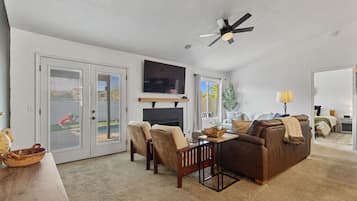 Smart TV, fireplace, books
