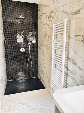 Shower, hair dryer, towels, soap