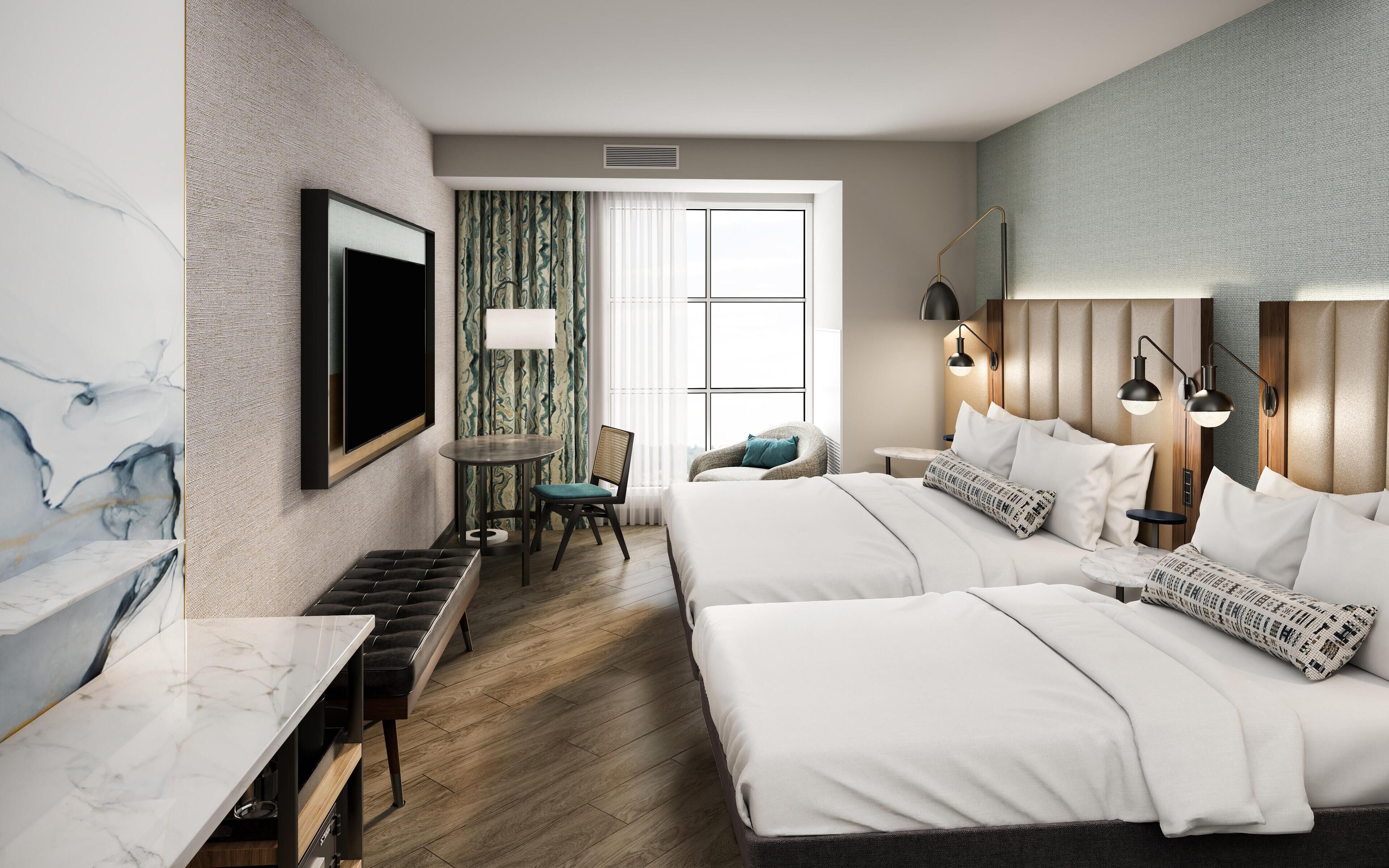 Espacio para trabajar con laptop, cortinas blackout y ropa de cama 