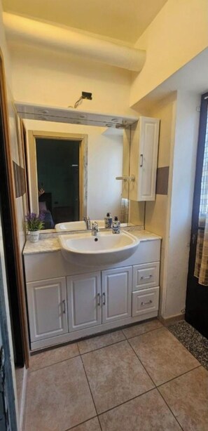 Hair dryer, bidet, towels, soap