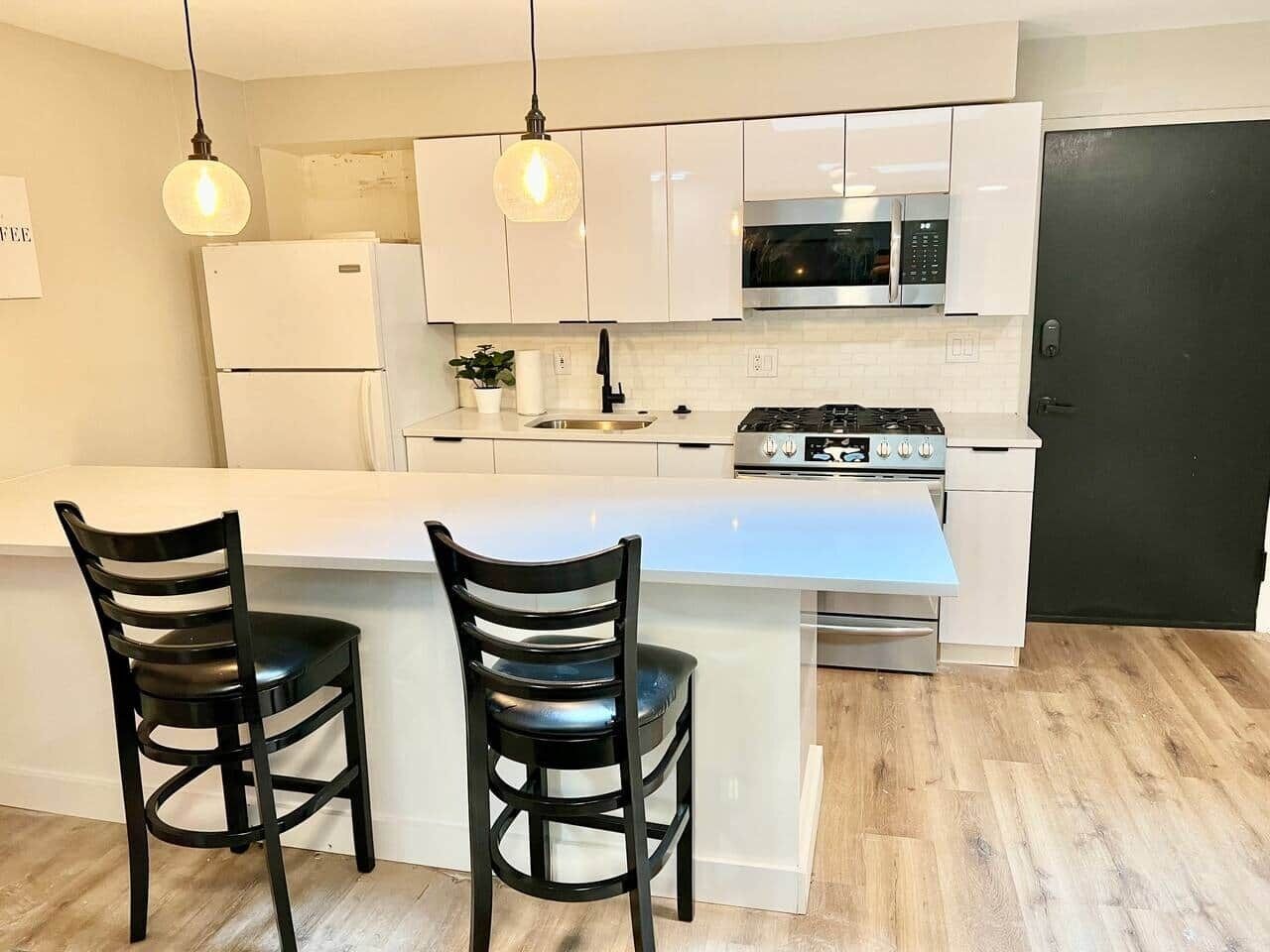 Fridge, stovetop, high chair, cookware/dishes/utensils