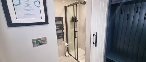 Shower, hair dryer, towels, soap
