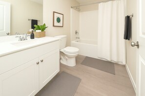 Hair dryer, towels, soap, toilet paper