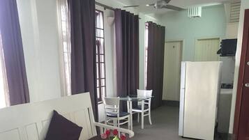 Studio, 1 Queen Bed, Non Smoking, Private Bathroom | Living area | LCD TV